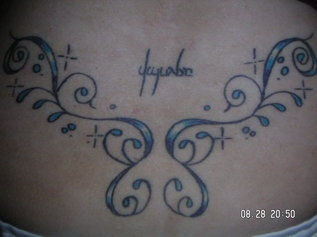 My lower back tattoo I designed all of my tattoos myself and this was my 