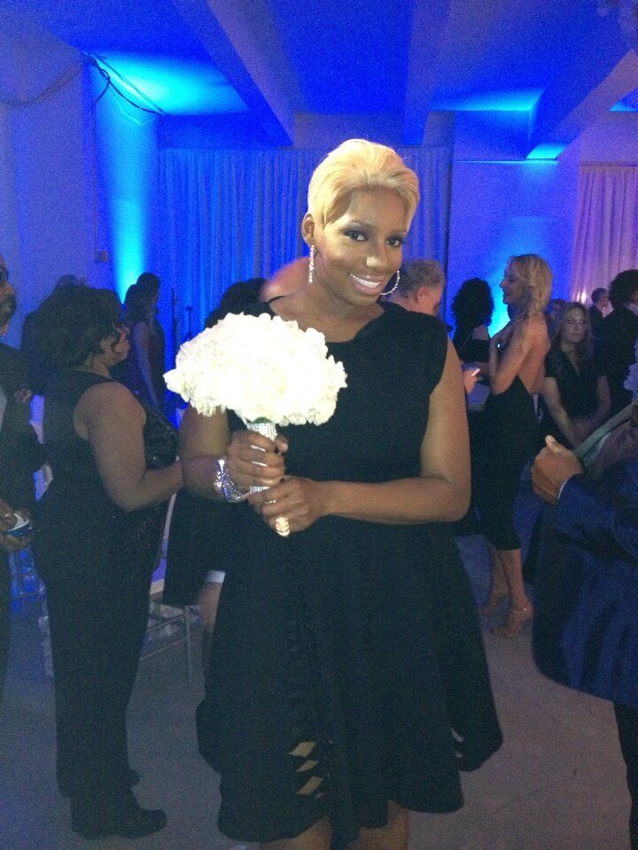  photo nene-leakes-midnight-wedding-catches-bouquet-the-jasmine-brand.jpeg