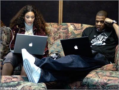 Jay and Beyonce on their laptops