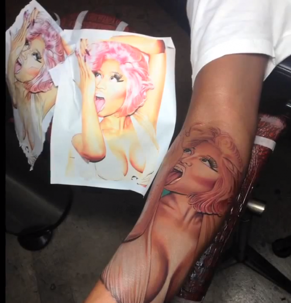  photo nicki-minajs-boyfriend-gets-face-tattoo-on-his-arm-the-jasmine-brand.png