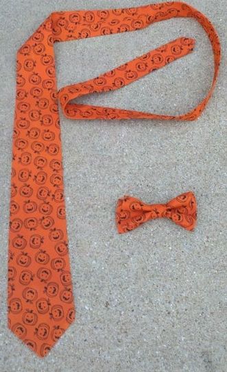 Jack-o-lantern tie and matching hair bow. (The bow is for Tabatha as I lack the hair to install it) photo photobucket-4323-1383169788082_zpse825ef37.jpg