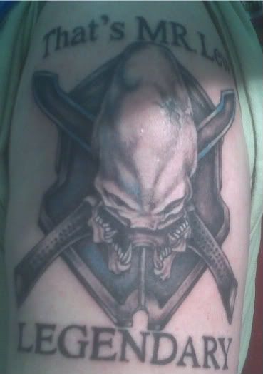 One of my longtime XBL friends recently got an extremely bad ass halo tattoo