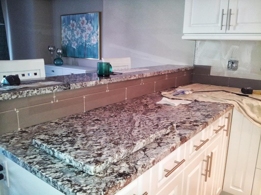 photo backsplashtileinstall_zpsbb1a3647.jpg