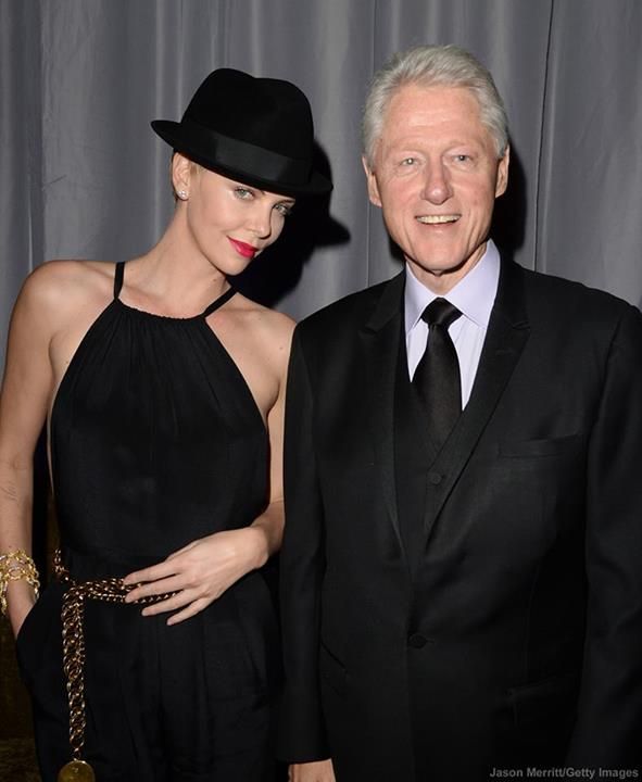bill clinton photo: Charlize Theron with former President Bill Clinton 969425_521028331288399_1781583843_n.jpg